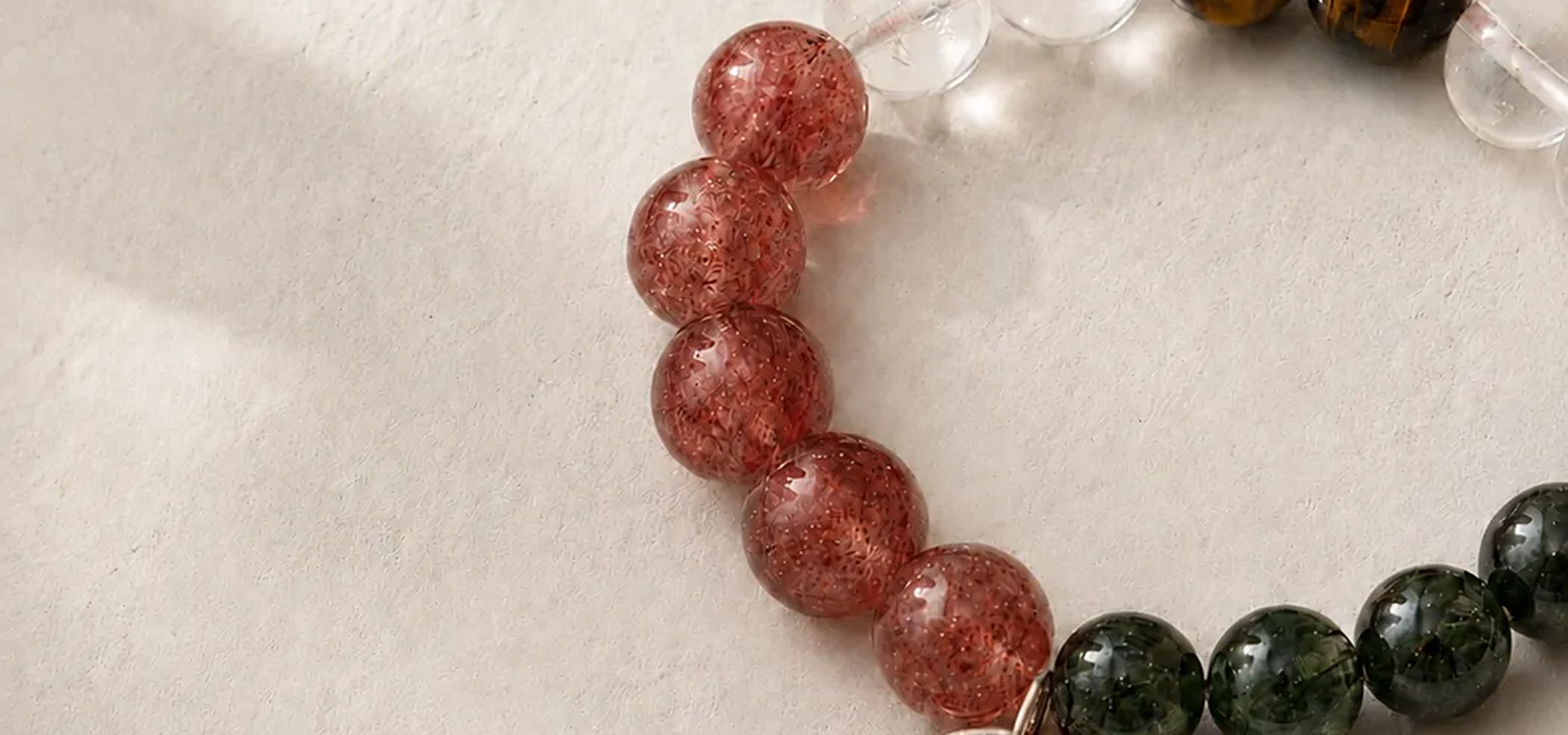 Color-rich Lumoola beaded bracelet with a silver medallion