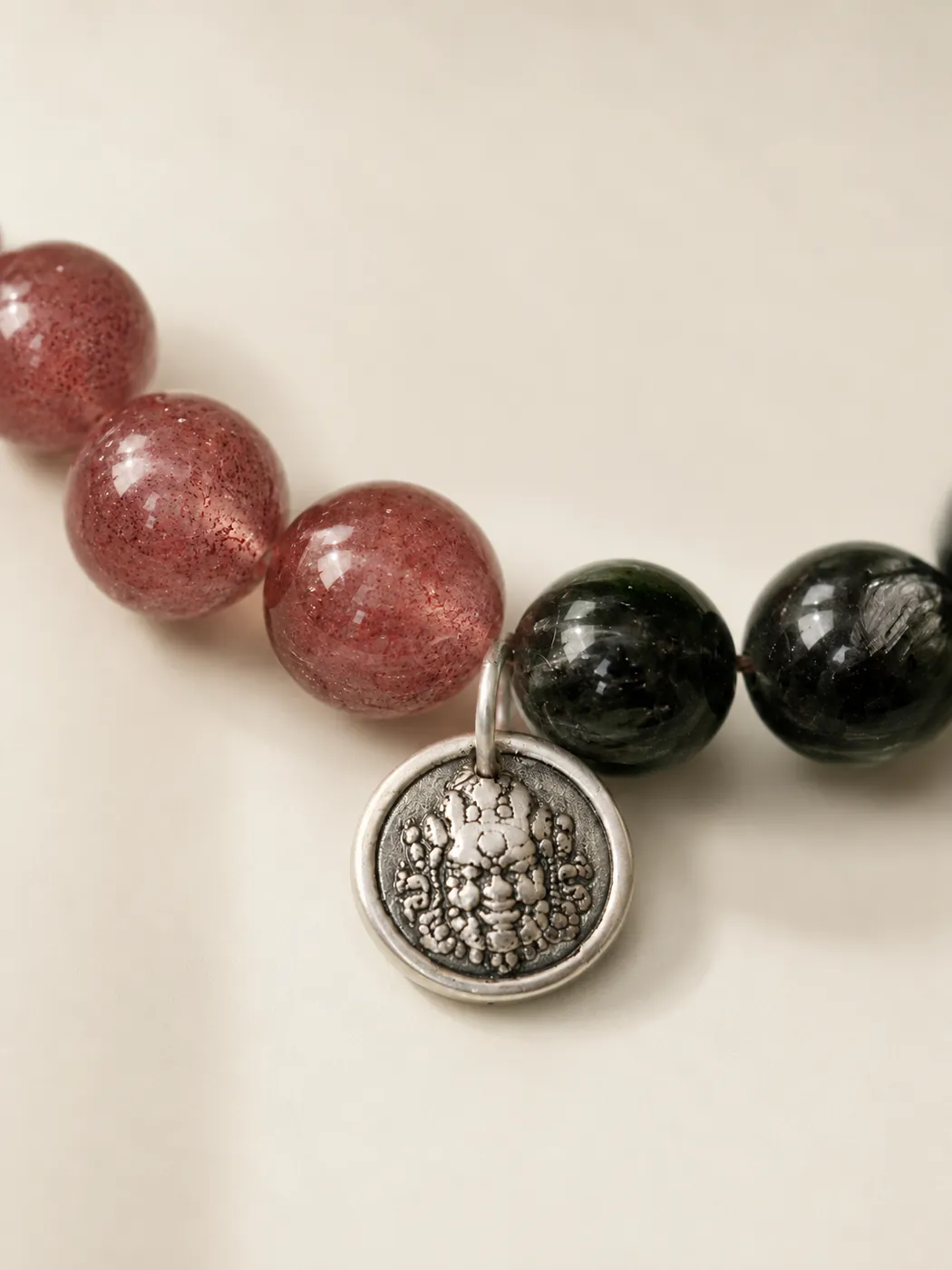 Autumn Ember Mixed-Bead Bracelet, bead and charm detail, showing its distinctive color story