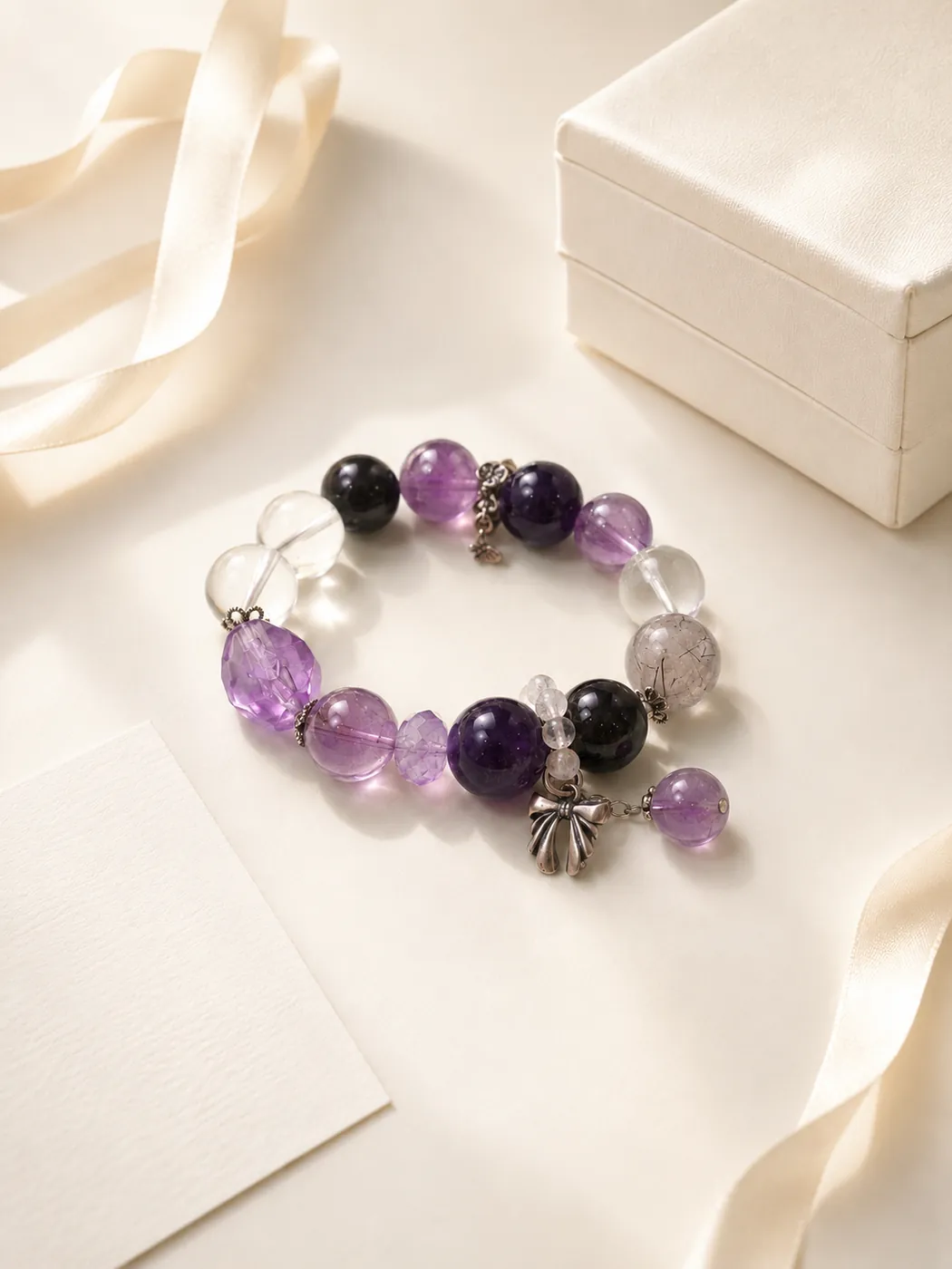 Crimson Grove Zodiac Charm Bracelet, gift presentation, showing its distinctive color story