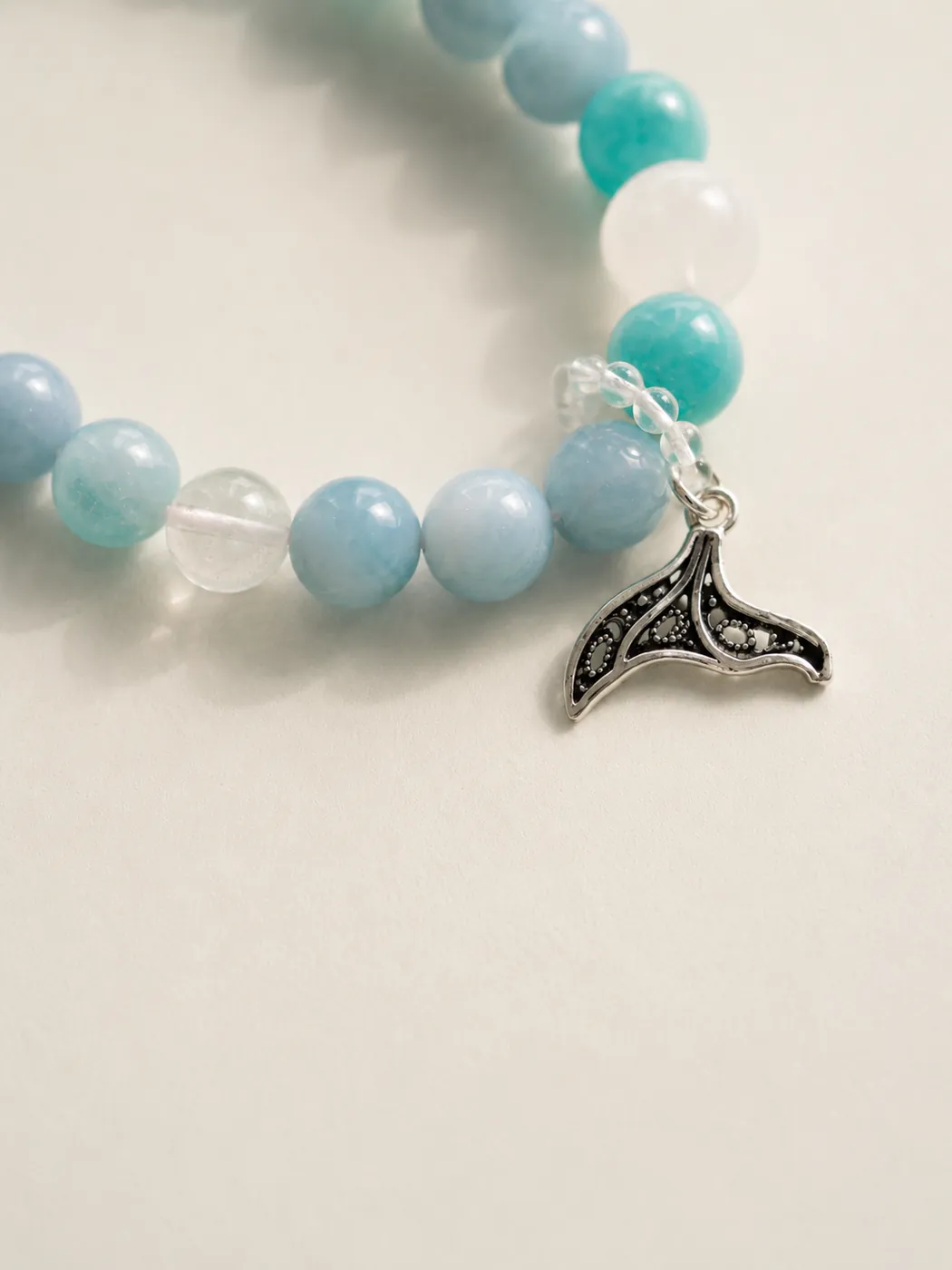 Ocean Whisper Whale Tail Bracelet, color and texture detail, showing its distinctive color story