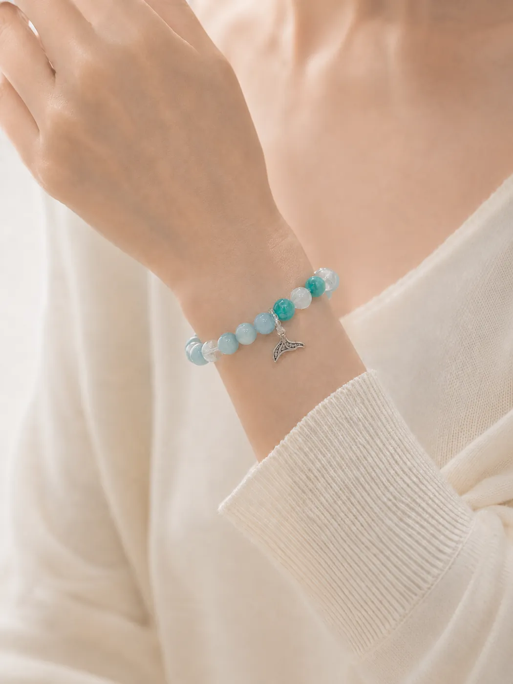Lumoola Signature Bracelet Trio, styled on wrist, showing its distinctive color story