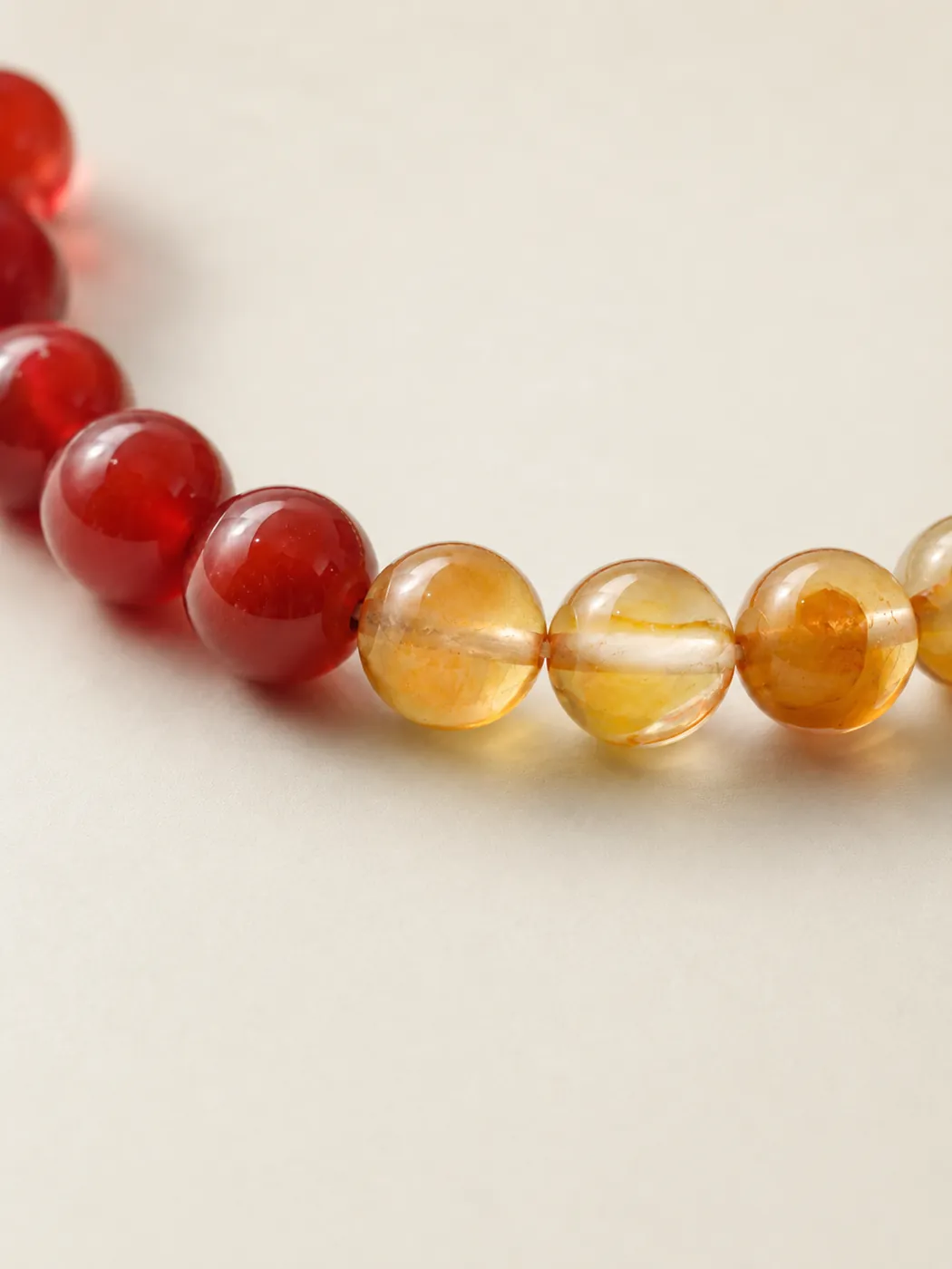 Sunset Ember Gold-Tone Accent Bracelet, color and texture detail, showing its distinctive color story
