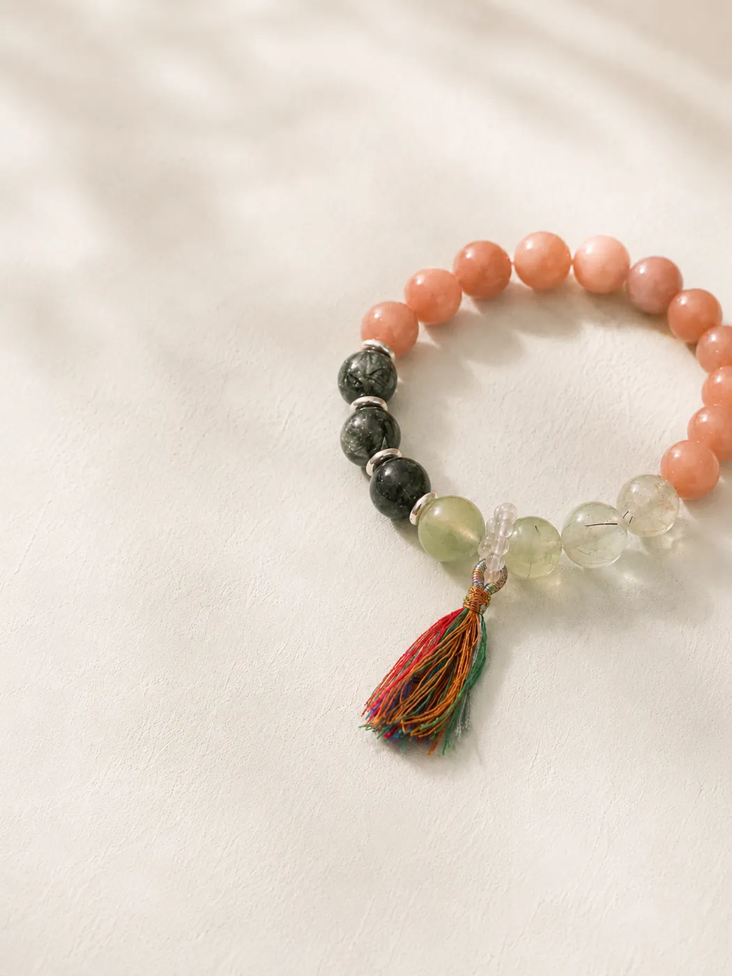 Sunset Grove Tassel Bracelet, editorial setting, showing its distinctive color story